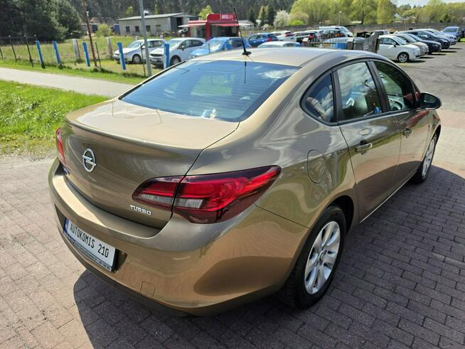 Opel Astra Sedan 1,4 benzynka w pięknym kolorze niski przebieg 117 tys Cielcza - zdjęcie 8