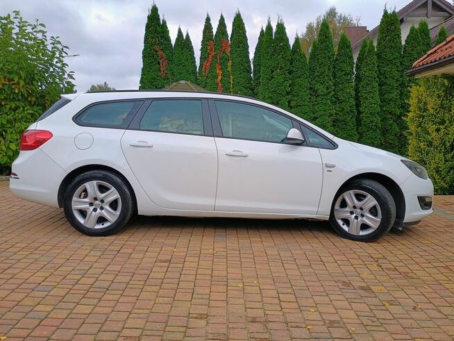Opel Astra J 1,6 CDTI Sports Tourer, 2014r. Poznań - zdjęcie 4