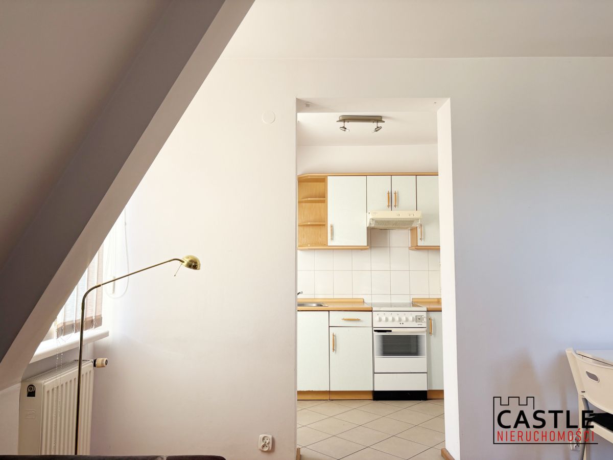 Jasna kawalerka z balkonami na klimatycznej Śródce Poznań - zdjęcie 4