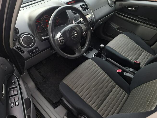 Suzuki SX4 * 4x4 * 1.6benzyna * BARDZO ŁADNE* klimatronik * relingi * Olsztyn - zdjęcie 7