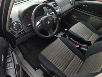 Suzuki SX4 * 4x4 * 1.6benzyna * BARDZO ŁADNE* klimatronik * relingi * Olsztyn - zdjęcie 7