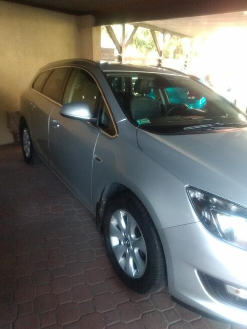Opel Astra J kombi + komplet kół Piastów - zdjęcie 3