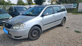 Toyota Corolla 1.4 benzyna z klimą kombi srebrny Tanie Auta Fasty