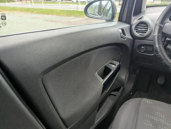 Opel Corsa 1.4 benzyna/bezwypadkowy/serwisowany/cena z opłatami Biała - zdjęcie 12