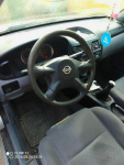 Sprzedam Nissan Almera 1.8 sedan rok 2003 Spytajny - zdjęcie 5
