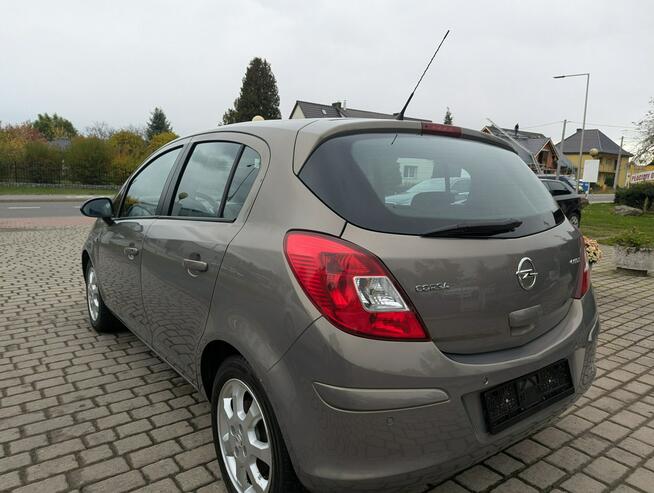Opel Corsa 1.4 benzyna/bezwypadkowy/serwisowany/cena z opłatami Biała - zdjęcie 6