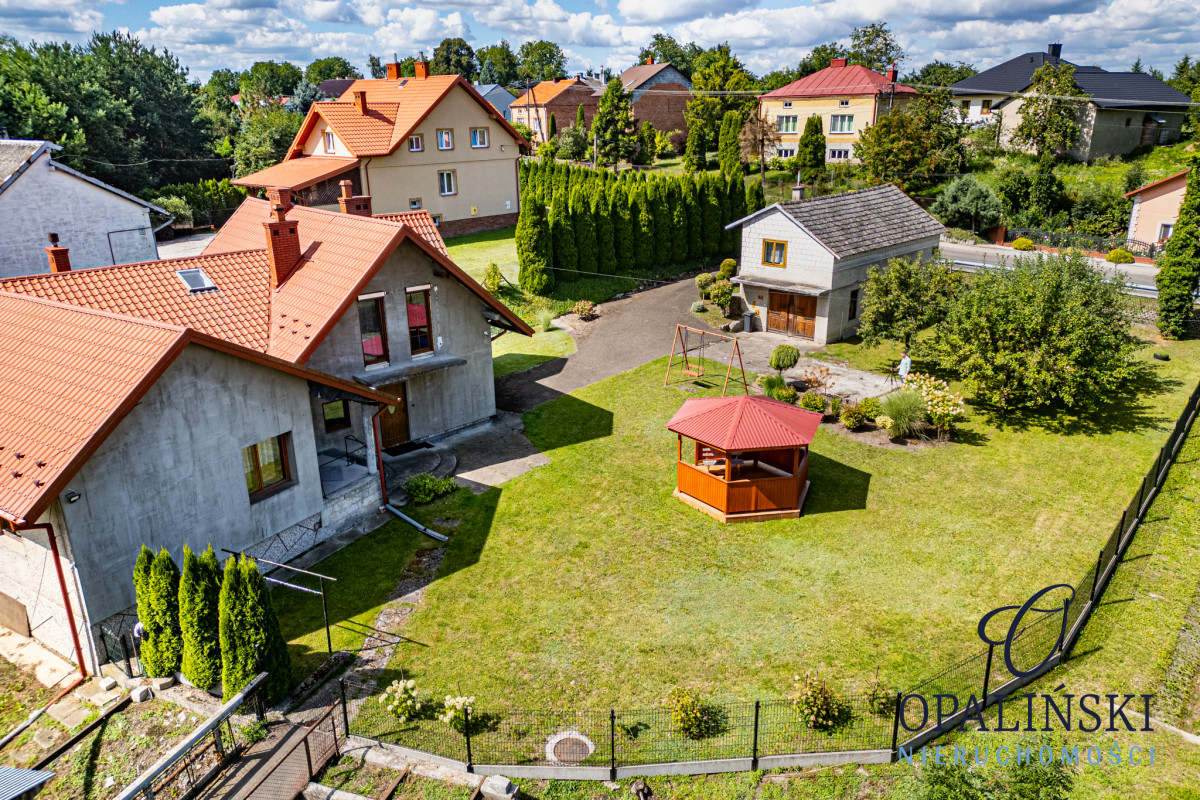 Komfortowy dom z ogrodem i garażem Tuczempy - zdjęcie 2