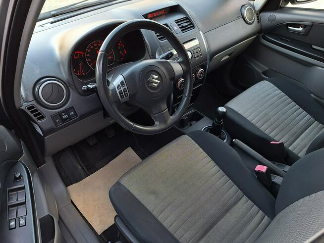Suzuki SX4 * 4x4* 1.6benz * BARDZO ŁADNE* ALUfelgi* KLiMATRONiK* ESP * Olsztyn - zdjęcie 10