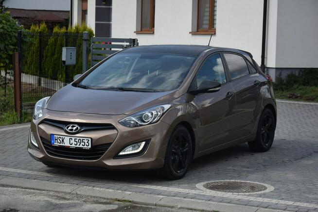 Hyundai i30 1.4B MPI Navi Kamera 99 TYS KM Oryginał Lakier Sprowadzony Majdan Sieniawski - zdjęcie 1