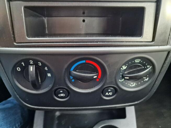 Ford Fiesta 1.3 Benzyna 60 KM, Klimatyzacja, 5-Drzwi, Lakier Metalik Słupsk - zdjęcie 12