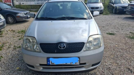 Toyota Corolla 1.4 benzyna z klimą kombi srebrny Tanie Auta Fasty Fasty - zdjęcie 2