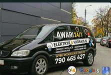 samochód z napisem Spec Złota, elektryk,hydraulik.