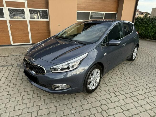 Kia Cee&#039;d 1.4 100KM  Klimatronik Orzech - zdjęcie 9