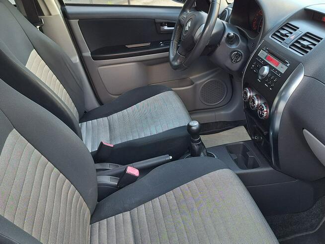 Suzuki SX4 * 4x4* 1.6benz * BARDZO ŁADNE* ALUfelgi* KLiMATRONiK* ESP * Olsztyn - zdjęcie 9