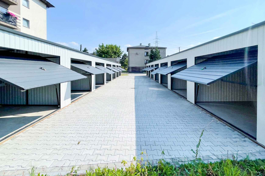 Rząd garaży 28x5,5m - 7x bramy uchylne  dach spad w tył  GP489 Lidzbark Warmiński - zdjęcie 10