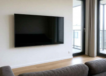 Montaż telewizora na ścianie Poznań i okolice wieszanie TV