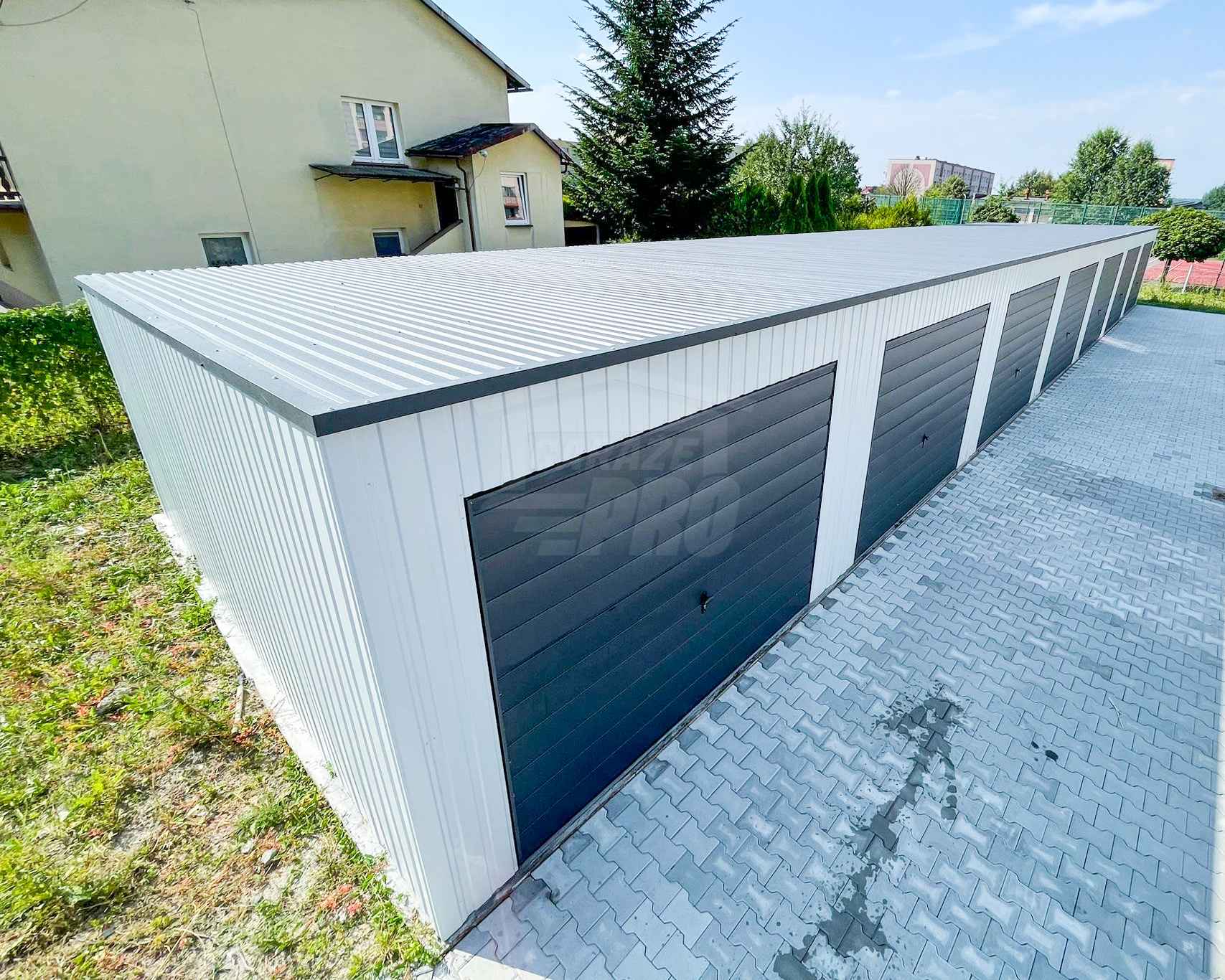 Rząd garaży 28x5,5m - 7x bramy uchylne  dach spad w tył  GP489 Lidzbark Warmiński - zdjęcie 3