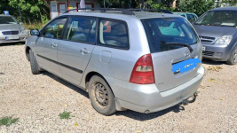 Toyota Corolla 1.4 benzyna z klimą kombi srebrny Tanie Auta Fasty Fasty - zdjęcie 7