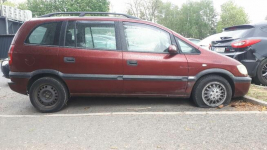 Syndyk sprzeda samochód osobowy Opel Zafira (Bordowy) Warszawa - zdjęcie 3