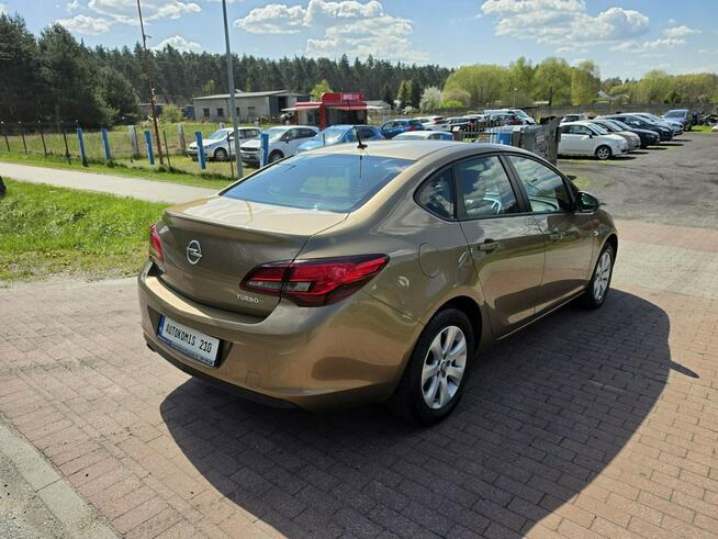 Opel Astra Sedan 1,4 benzynka w pięknym kolorze niski przebieg 117 tys Cielcza - zdjęcie 7