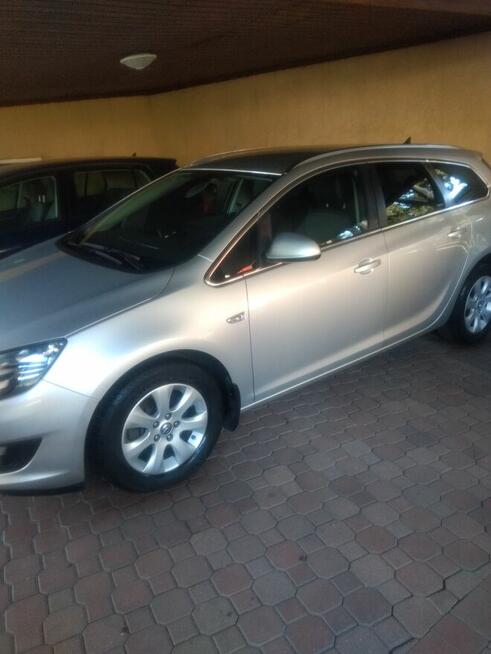 Opel Astra J kombi + 2 komplet kół Piastów - zdjęcie 1