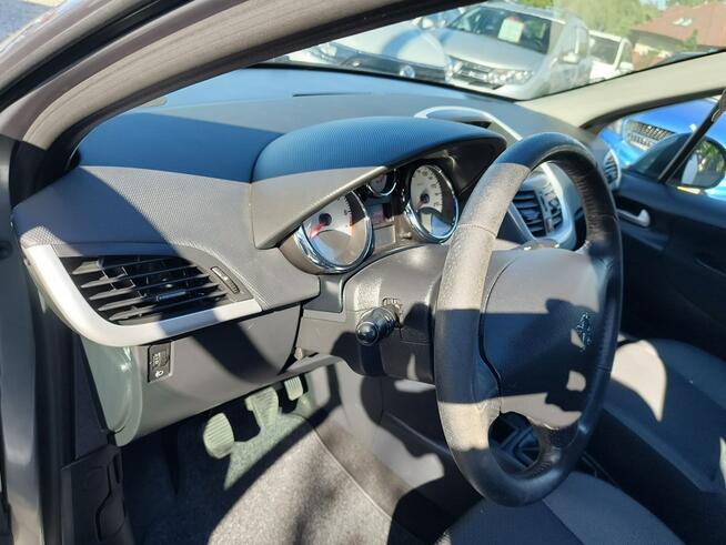 Peugeot 207 1.4 Benzyna 73 KM Zarejestrowany  Oryginalny Przebieg Twardów - zdjęcie 11