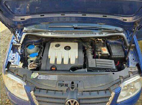 Syndyk sprzeda Volkswagen Touran 2,0 Szczecin - zdjęcie 12