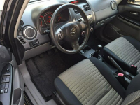 Suzuki SX4 * 4x4 * 1.6benzyna * BARDZO ŁADNE* klimatronik * relingi * Olsztyn - zdjęcie 8