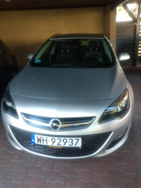 Opel Astra J kombi + 2 komplet kół Piastów - zdjęcie 2