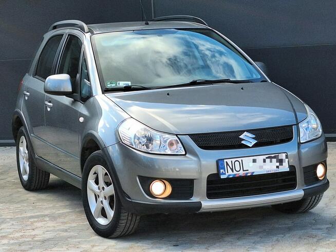 Suzuki SX4 * 4x4* 1.6benz * BARDZO ŁADNE* ALUfelgi* KLiMATRONiK* ESP * Olsztyn - zdjęcie 1