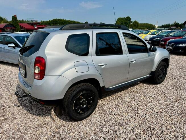 Dacia Duster Lift 1,6 2013 rok tylko 106 tys km Stan Bardzo Dobry Szerominek - zdjęcie 4